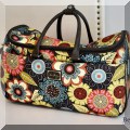 H11. Vera Bradley rolling duffle. 